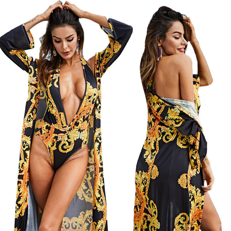 One-piece swimsuit with printed cape