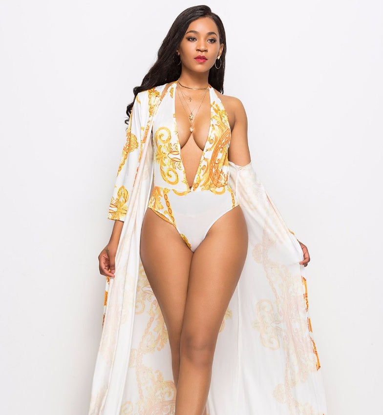 One-piece swimsuit with printed cape