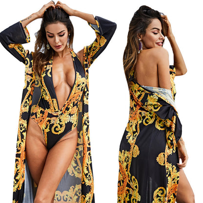 One-piece swimsuit with printed cape