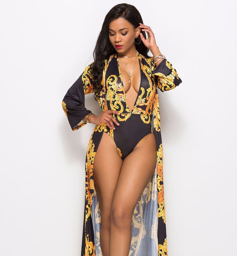 One-piece swimsuit with printed cape